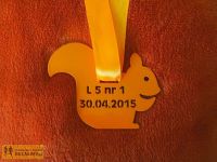 Pomarańczowa wiewiórka jako pierwszy medal dla dzieci w Leśnej Piątce 2015.